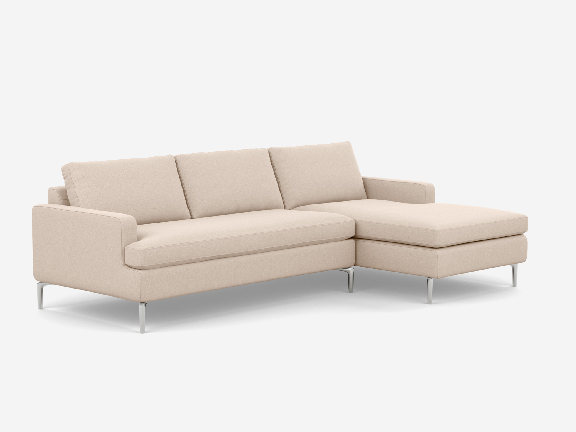 angle view of the Eve Grand modular sofa in white fabric with right hand chaise